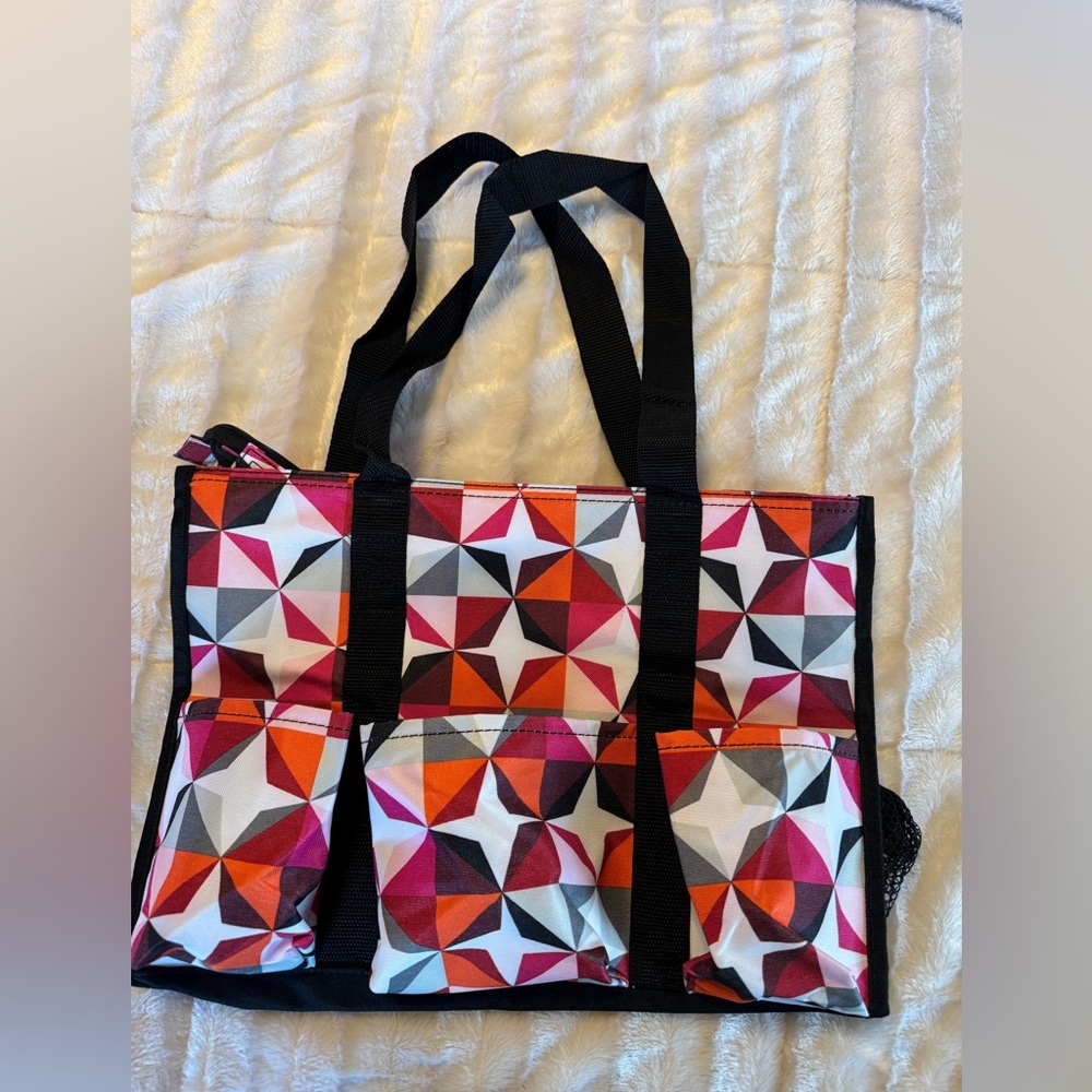 Thirty One Origami Pop tote bag 10”H x 15”L x 6”W and zipper pouch is 8”H x 12”L